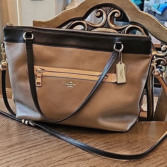 Coach Handbags - Coach leather purse tan black and taupe excellent new condition